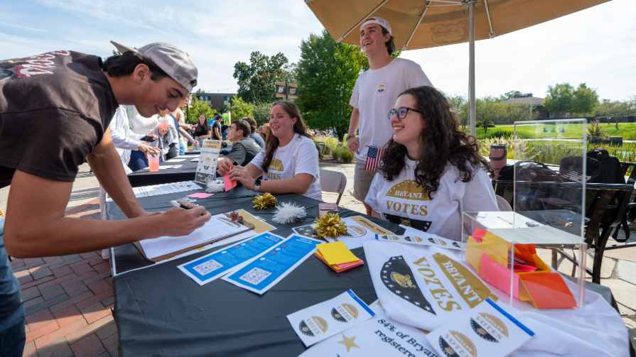 Bryant student signs up for Bryant Votes.